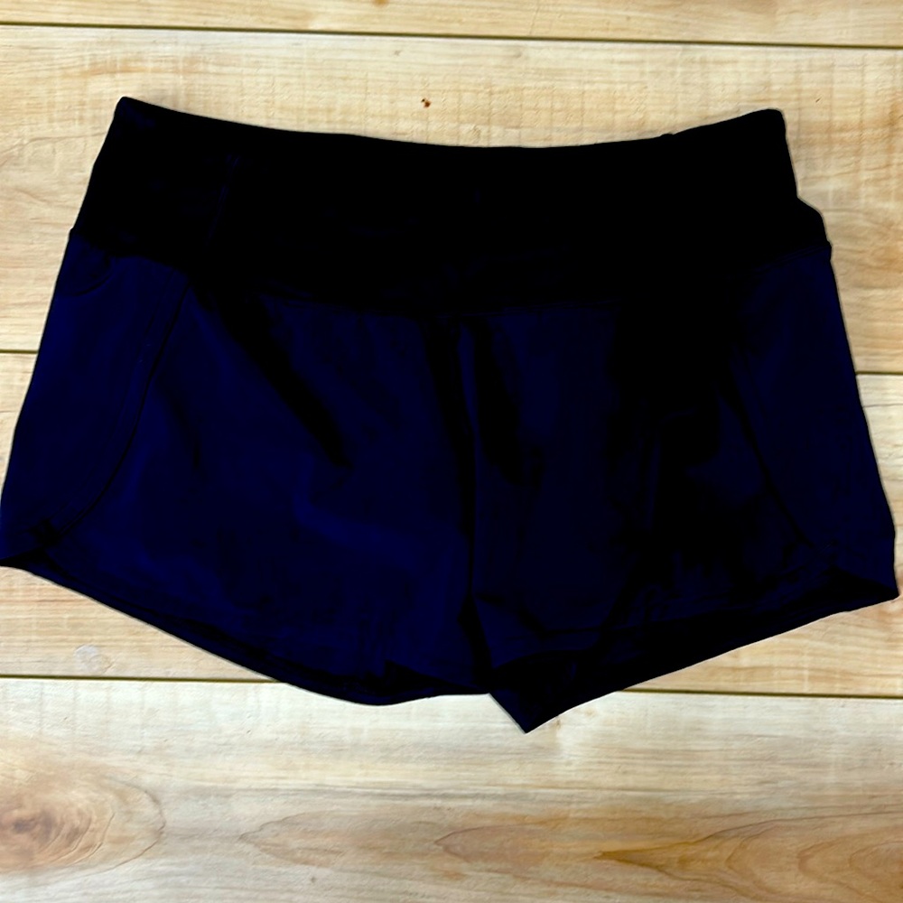 Lululemon shorts! Small imperfection along bottom on the back of shorts.